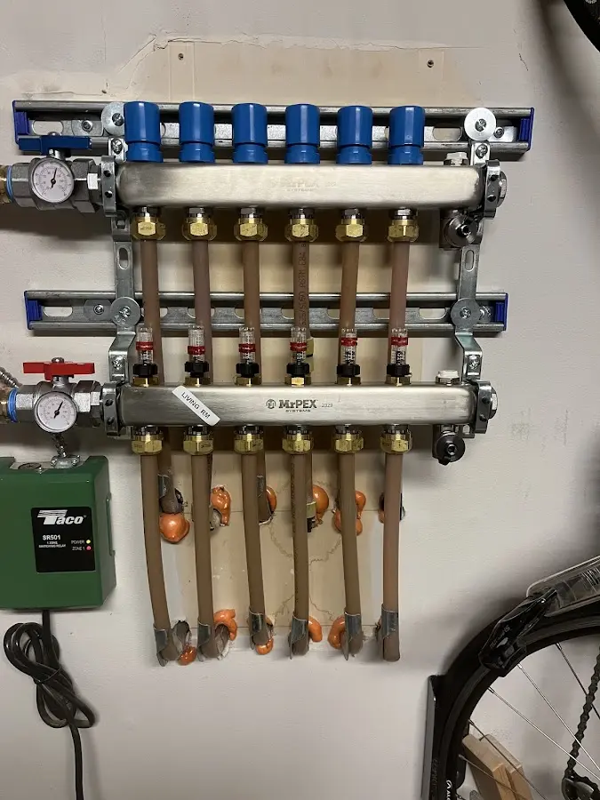 Plumber performing Water Heater Repair at a residential property in Friona